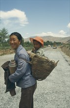 CHINA, People, Mother with Child in Basket