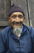 CHINA, Guizhou Province, Anshun, "Elderly man, head and shoulders portrait."