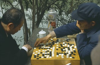 CHINA, Chengdu , Men playing Go