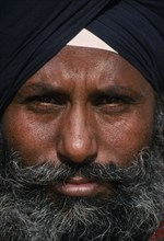 INDIA, Punjab, People, Portrait of man with grey beard and black turban