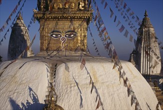 NEPAL, Kathamndu Valley, Swayambhunath, Swayambhunath Temple roof with painted eyes of Buddha and