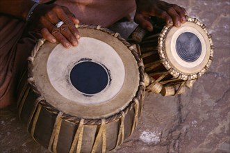INDIA, Uttar Pradesh, Vrindavan, Cropped shot of tabla player.