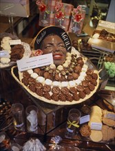 BELGIUM, Brabant  , Brussels , A shop display of an assortment of hand made chocolates