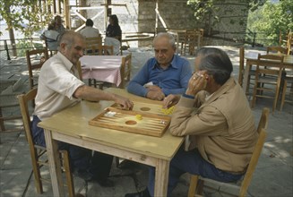 GREECE, Daily Life, Men Playing Backgammon outydoors
