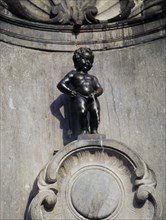 BELGIUM, Brabant, Brussels, "Manneken Pis, a statue of a little boy urinating into the fountain's