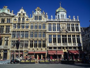 BELGIUM, Brabant, Brussels, "The Grand Place, west side facade with outdoor restaurants."