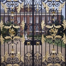 ENGLAND, London, Kensington Palace with gate details in front