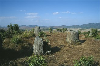 LAOS, Near Phonsavan, Plain of Jars. Landscape with huge scattered stone jars of unknown origin.