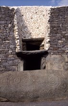 IRELAND, County Meath, Newgrange, Entrance to Prehistoric Burial Site in the Boyne Valley with