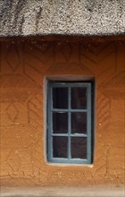 SOUTH AFRICA, Qwa Qwa, Basotho Cultural Village, Detail of typical house with green framed window