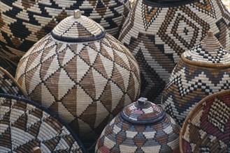 SOUTH AFRICA, Zululand  , Baskets woven by Zulu women made from Lala Palm and coloured with juices
