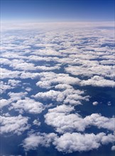 CLIMATE, Clouds, Above Clouds, Aerial view above sparse clouds from plane flying over Siberia