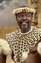 SOUTH AFRICA, KwaZulu Natal, Eshowe, Baba Ngema a local chef dressed in leopard skin