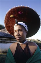 SOUTH AFRICA, KwaZulu Natal, Msinga, Zulu woman wearing hat