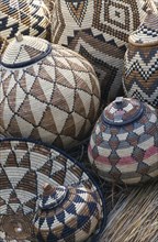 SOUTH AFRICA, Zululand  , Baskets woven by Zulu women from Lala palm and died with juices of tree