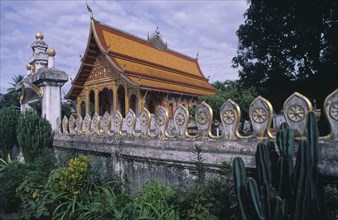 LAOS, Luang Prabang , Wat Nong Sikhuawang with cacti in the foreground.