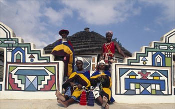 SOUTH AFRICA, KwaZulu Natal, Mpumalanga, Ndebele Cultural Village at White River with women in