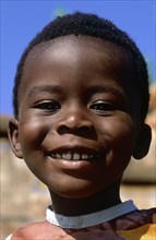 SOUTH AFRICA, KwaZulu Natal, Mpumalanga, Portrait of a young Ndebele boy in Botshabelo near