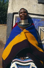 SOUTH AFRICA, Mpumalanga, Botshabelo, "Near Middleburg, local woman in traditional dress inc. large