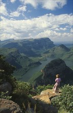 SOUTH AFRICA, Mpumalanga  , Blyde River Canyon, View from 3 Rondavels Point with a woman standing