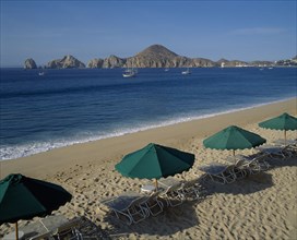 MEXICO, Baja California, Cabo San Lucas, Menano beach area View over beach to surrounding coastline