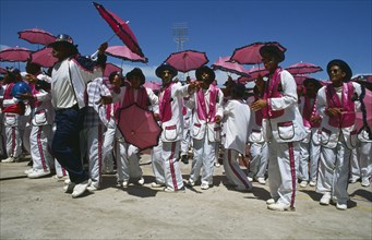 SOUTH AFRICA, Cape Town, "Coon Carnival, procession of men in colourful clothing. "