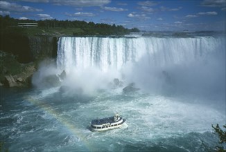 CANADA, Ontario, Niagara Falls, Maid of the Mist  approaching the Horseshoe Falls