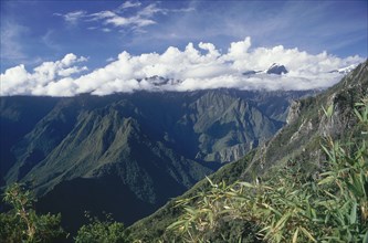PERU, Cusco Department, Machu Picchu , The Inca trail mountain view from Machu Pichu with clouds