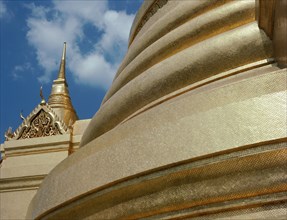 THAILAND, Bangkok, Wat Phra Kaew Grand Palace detail of golden domed buildings