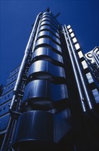 ENGLAND, London, The exterior of the Lloyds building at night