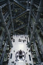 ENGLAND, London, The interior of the Lloyds building showing the central atrium trading floor