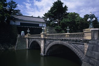 JAPAN, Honshu, Tokyo, Imperial Palace with old stone bridge in front