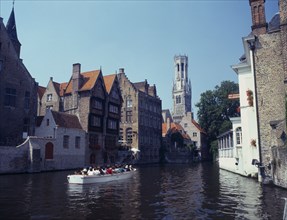 BELGIUM, West Flanders, Bruges, "Rozenhoedkaai and Belfry, boat trip on the canal."