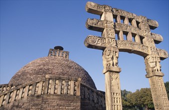 INDIA, Madhya Pradesh Sanchi Stuppa, Sanchi, Carved stupa and Torana.