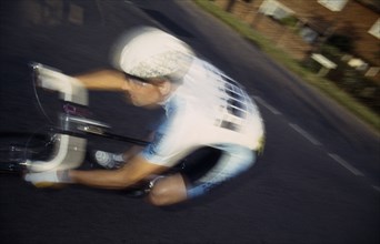 10086717 SPORT  Cycles Cycle rider on racing bicycle in motion blur