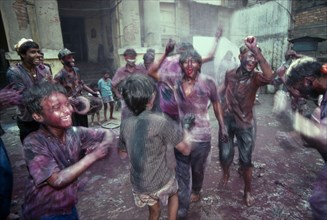 INDIA, West Bengal, Calcutta , Celebrating Holi Festival