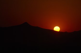 WEATHER , Climate, Sunset , Sunset over hills