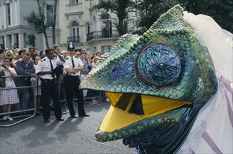 ENGLAND, London, Reptile costume at the Notting Hill Carnival