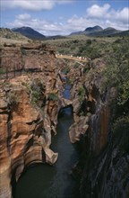 SOUTH AFRICA, East Transvaal, Blydes River Canyon, Bourkes Luck Potholes with people crossing