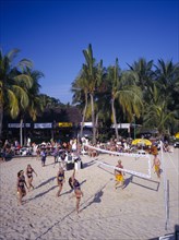 SINGAPORE, Sentosa Island, "Siloso Beach, volley ball game on sandy beach, palms "