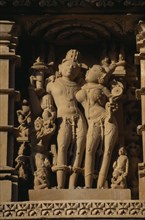 INDIA, Madhya Pradesh, Khajuraho, Detail of Kandariya temple carvings