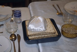 ISRAEL,  , Haifa, Passover matza & Cuppel on table