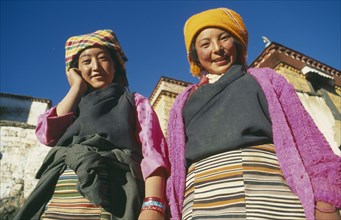 TIBET, Lhasa, Sera Monastery, Two Tibetan women outside monastery