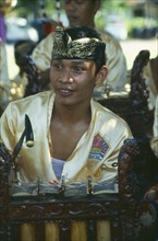 INDONESIA, Bali, Klunkung, Gamelan musician at Royal cremation