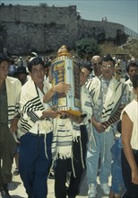 ISRAEL, Jerusalem, Bar Mitzvah at ethe Western Wall with the Torah being carried