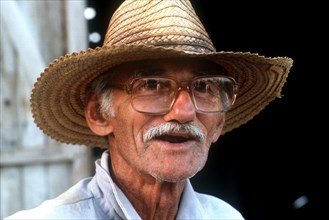 CUBA, Pinar Del Rio , Portrait of a farmer in a straw hat