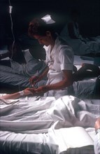 CUBA, Havana, Nurse In Maternity Hospital