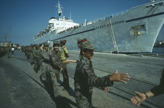 CUBA, Military, Soldiers returning from Angola being greeted at the docks.