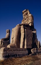 EGYPT, Thebes, The Colossi of Memnon. The only remains of the Mortuary Temple of Amenophis III