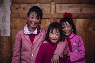CHINA, Sichuan Province, Portrait of three Tibetan girls.